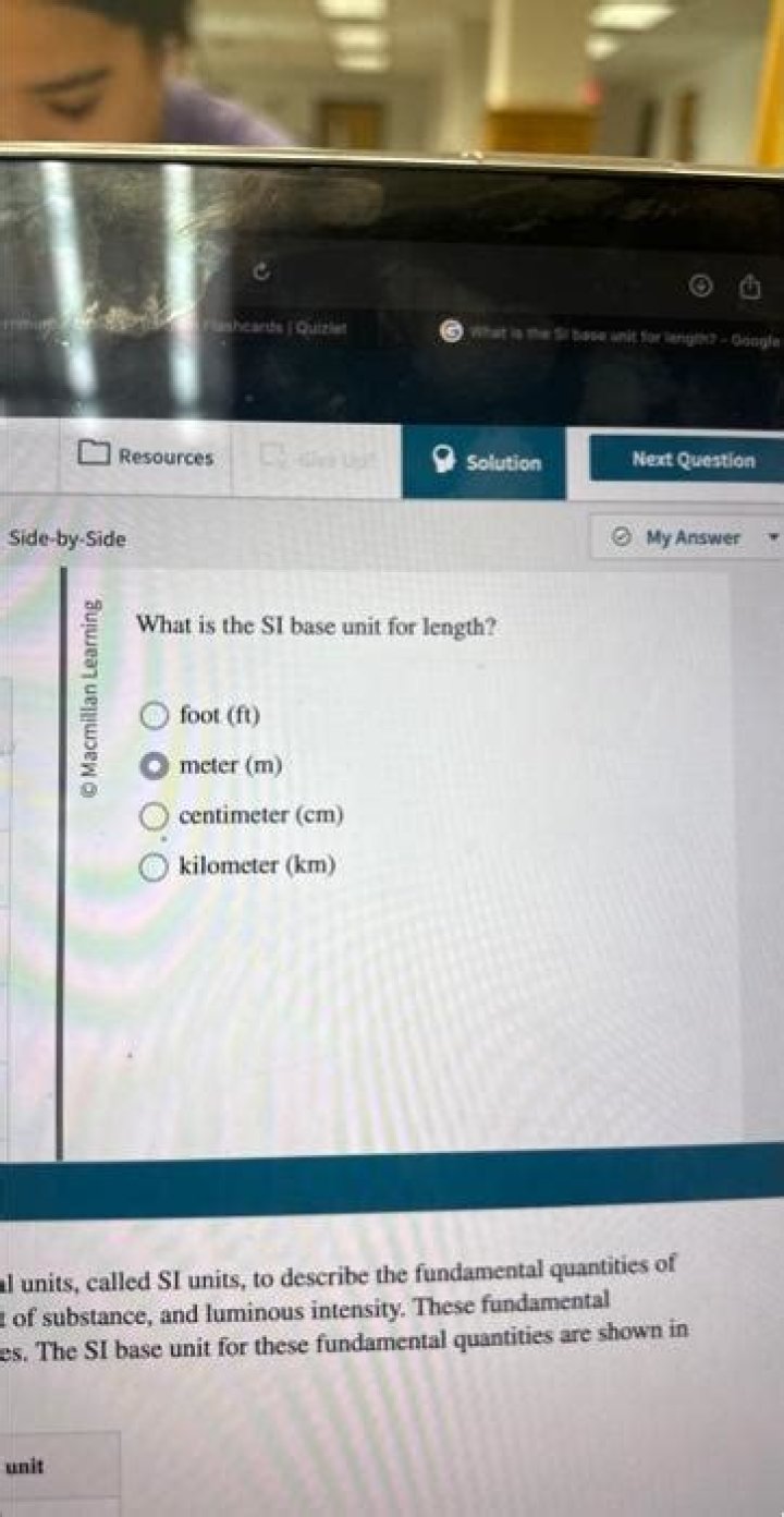 What is the SI base unit for length?